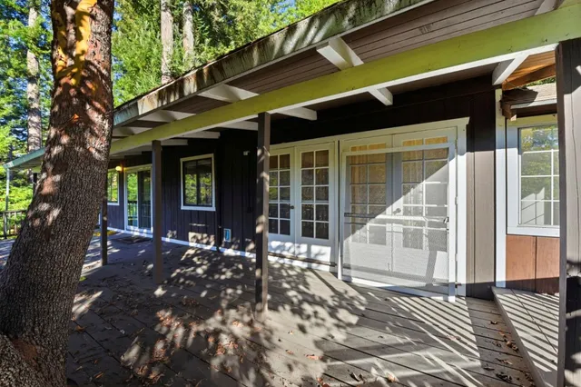 a view of a balcony with wooden floor