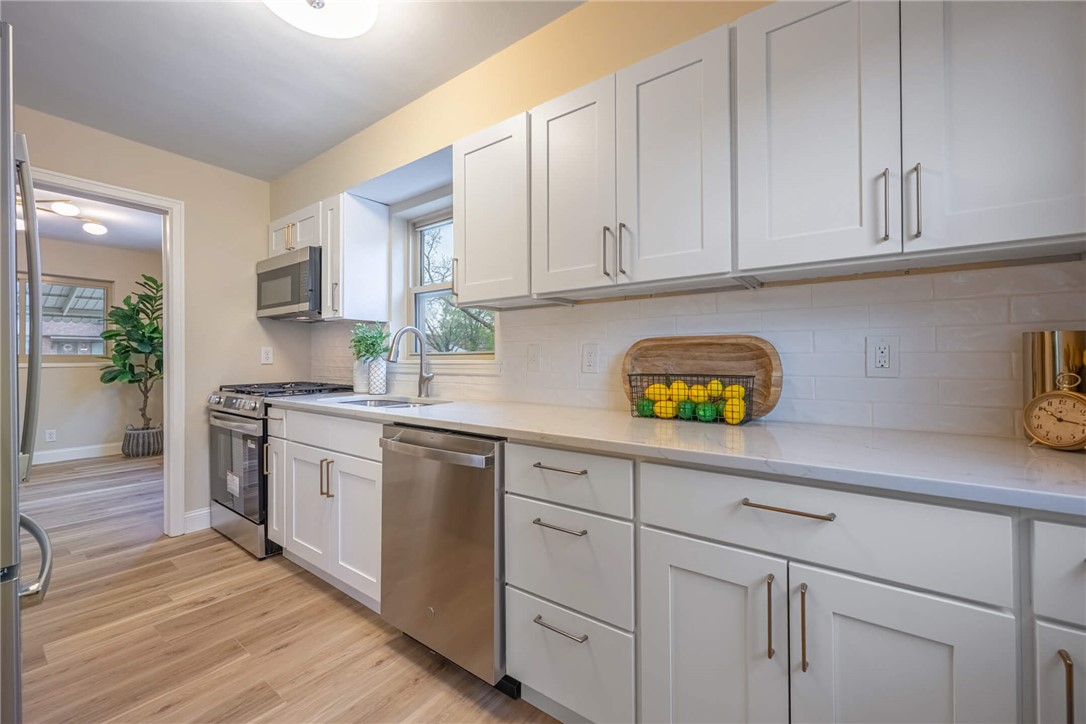 1012 Hampshire Road Dayton, OH 45419 - Photo 14 of 39 This bright kitchen features sleek appliances and ample counter space for culinary pursuits.