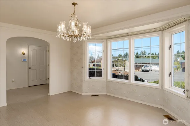 a view of a kitchen with a sink cabinets and a window