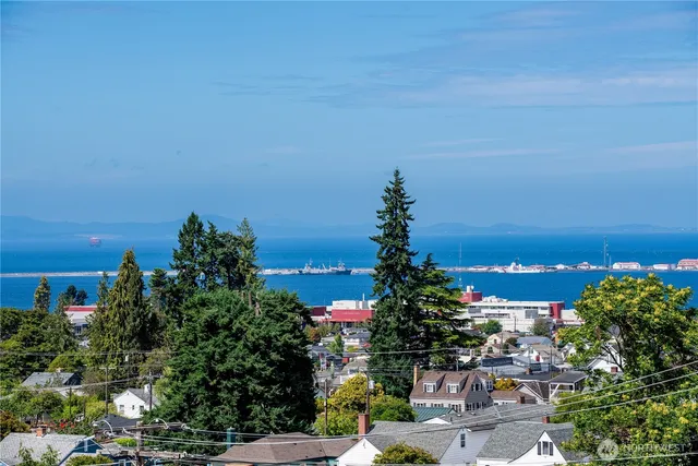 a view of a city with a building in the background