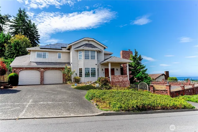 front view of a house with a street