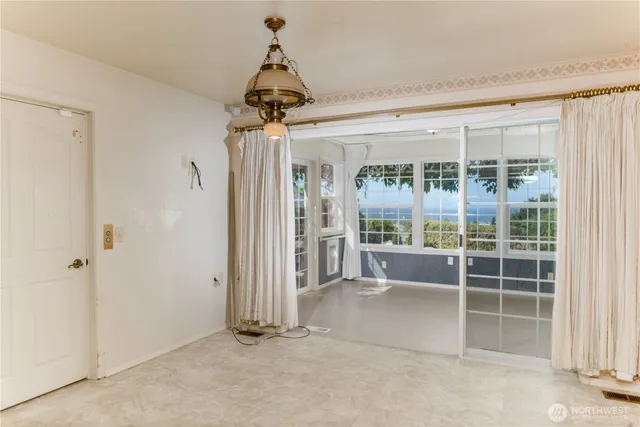 a kitchen with a sink cabinets and window