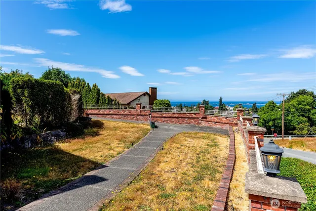 a view of outdoor space and wooden deck