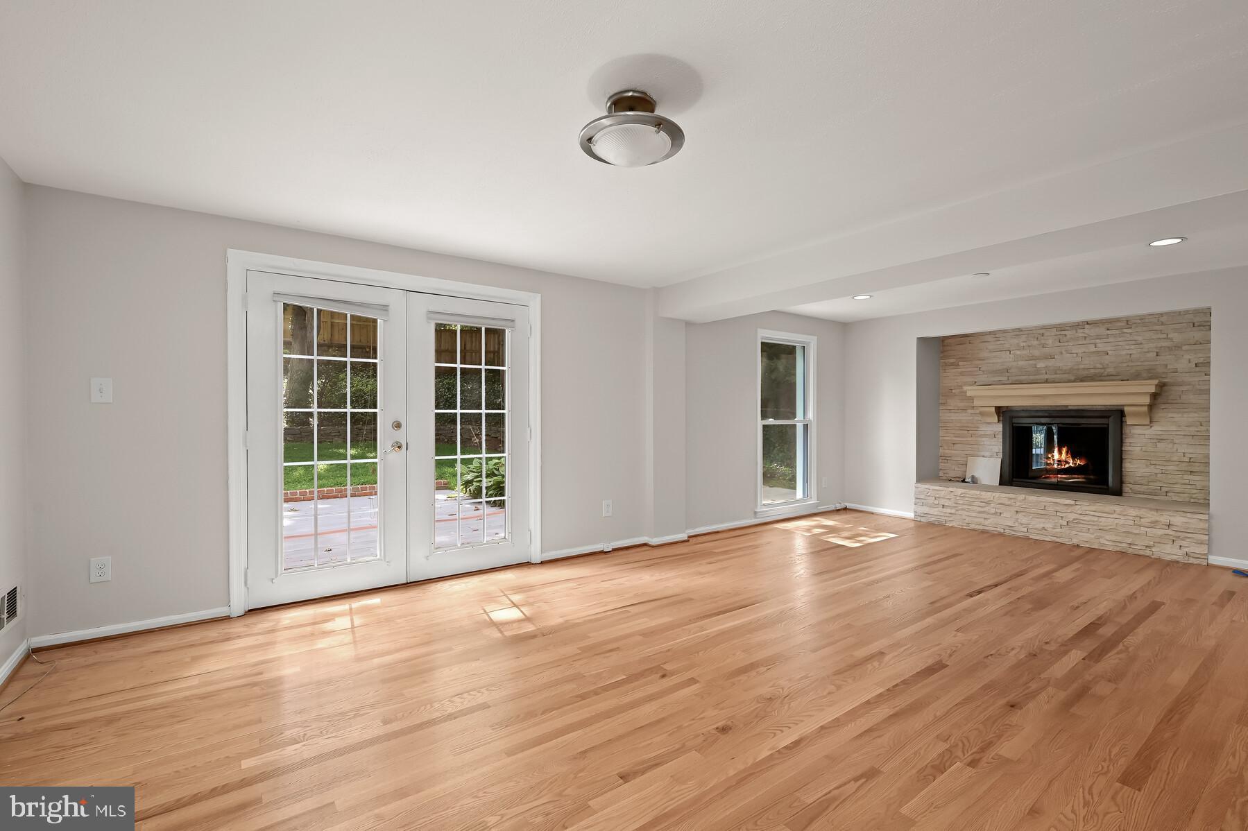7701 Sebago Road Bethesda, MD 20817 - Photo 34 of 50 Recreation room with walkout to rear yard