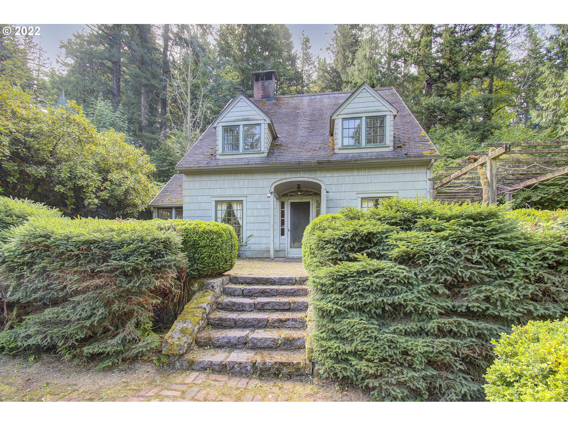 1110 Southeast Littlepage Road Corbett, OR 97019 - Photo 1 of 31 a front view of a house with a yard
