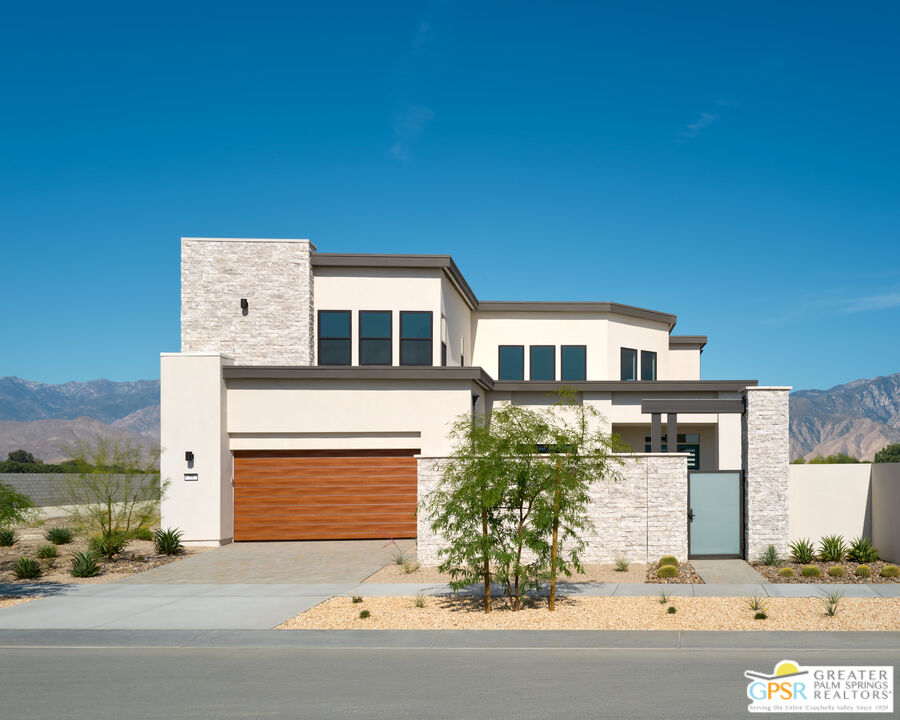 79 Harmonious Drive, Unit LOT #160 Rancho Mirage, CA 92270 - Photo 1 of 2 front view of a building with a street