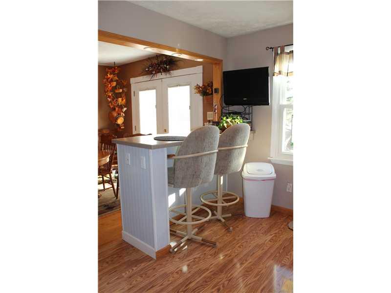 423 Ceylon Road Carmichaels, PA 15320 - Photo 8 of 25 Kitchen. Kitchen has pretty laminate flooring and lovely breakfast bar
