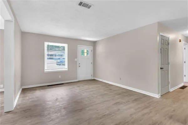 an empty room with windows