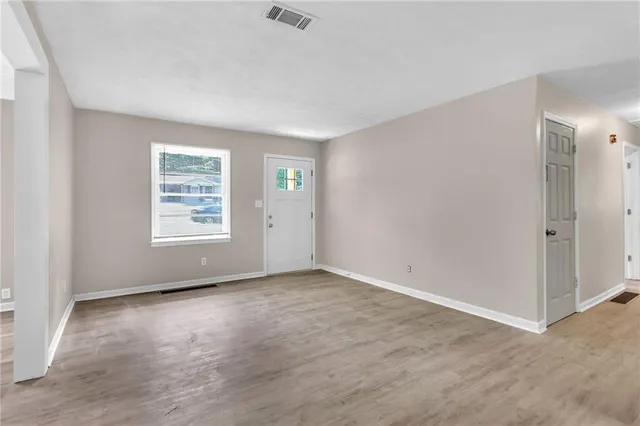 an empty room with windows