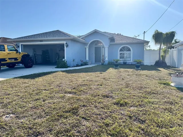 a house view with a garden space