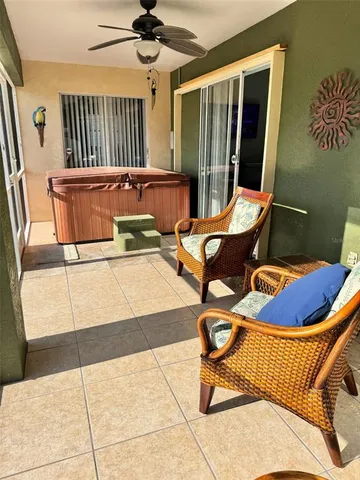 a living room with patio furniture