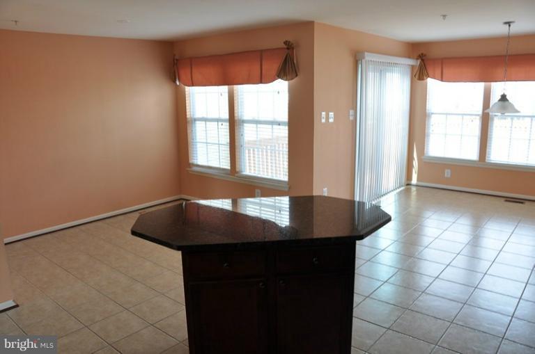 9744 Biggs Road Baltimore, MD 21220 - Photo 3 of 30 a dining room with window