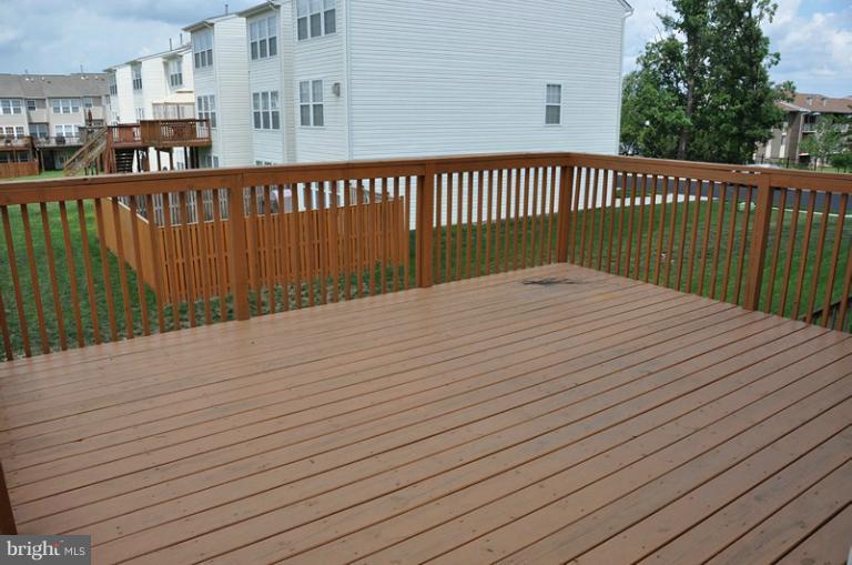 9744 Biggs Road Baltimore, MD 21220 - Photo 21 of 30 a balcony with view of wooden floor