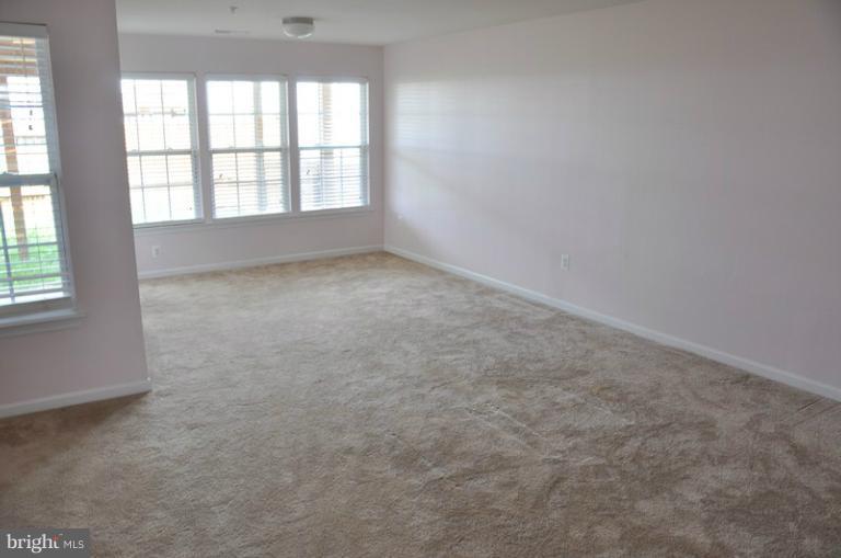 9744 Biggs Road Baltimore, MD 21220 - Photo 22 of 30 an empty room with a windows