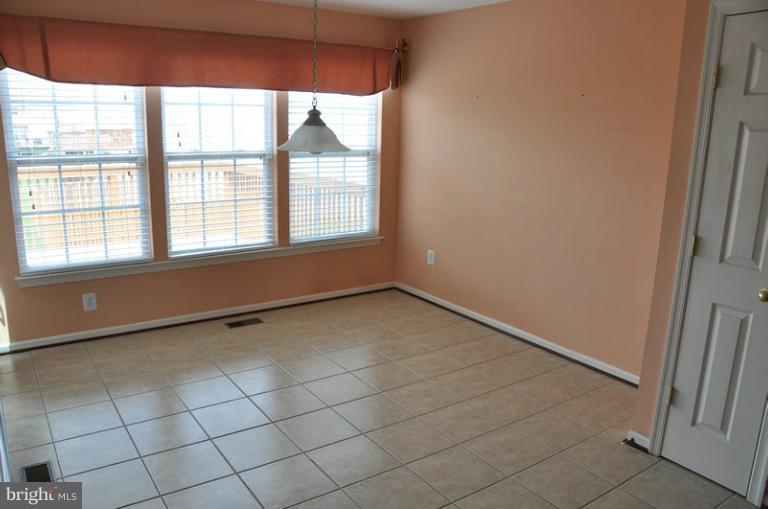 9744 Biggs Road Baltimore, MD 21220 - Photo 23 of 30 an empty room with a window