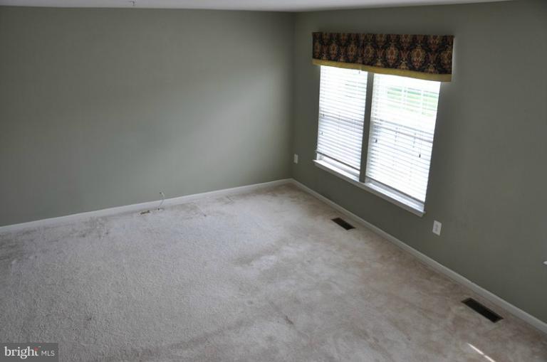 9744 Biggs Road Baltimore, MD 21220 - Photo 29 of 30 a view of an empty room and window