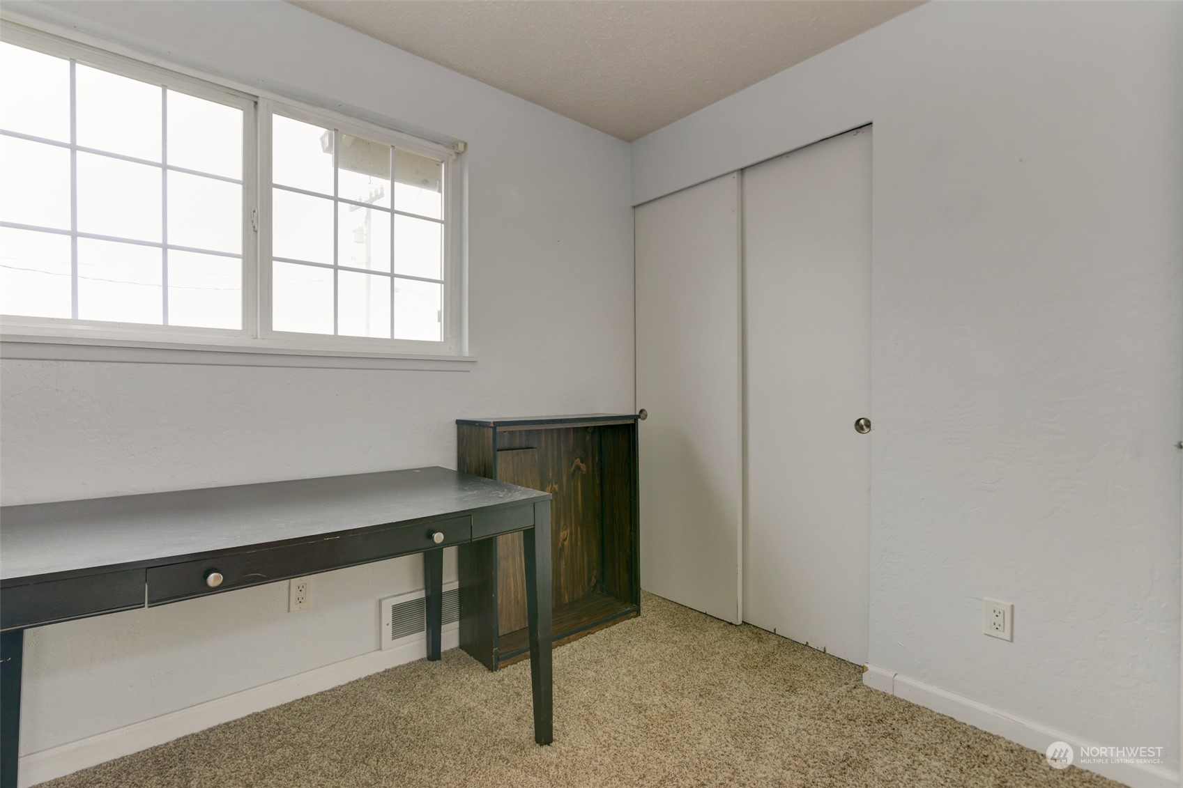 6721 183rd Avenue Southwest Rochester, WA 98579 - Photo 12 of 18 a room with windows
