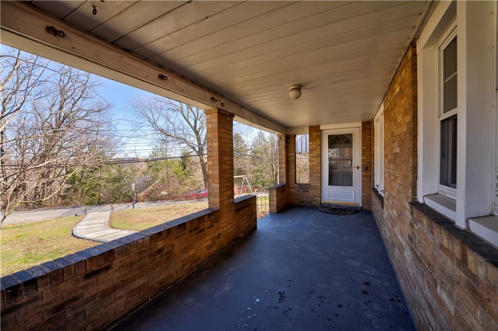 2024 Warriors Road Pittsburgh, PA 15205 - Photo 3 of 43 Enjoy the scenery from the covered front porch.