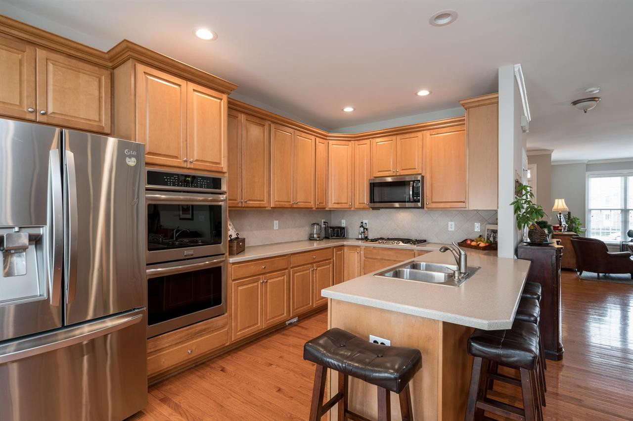 2309 St Paul's Square Raleigh, NC 27614 - Photo 10 of 30 Gourmet Kitchen w/ Breakfast Bar