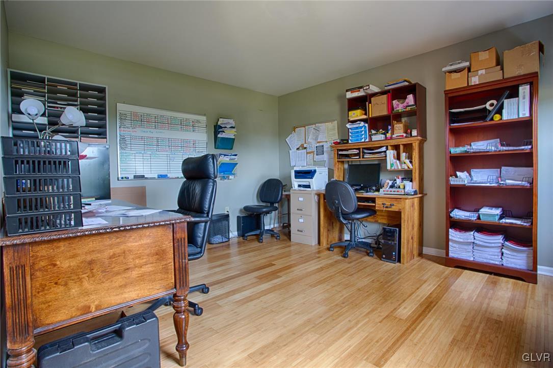 724 South Delps Road Bath, PA 18014 - Photo 11 of 23 a view of a workspace with furniture and wooden floor