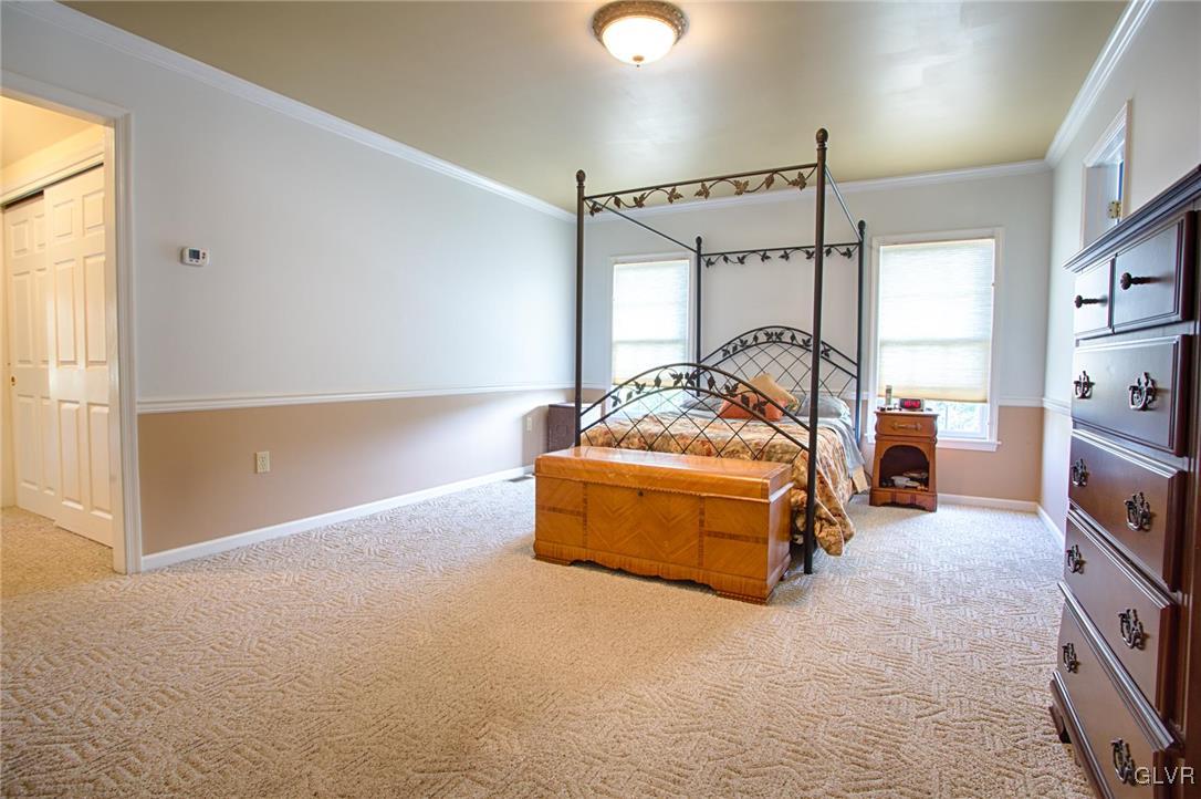 724 South Delps Road Bath, PA 18014 - Photo 12 of 23 a spacious bedroom with a bed and a window