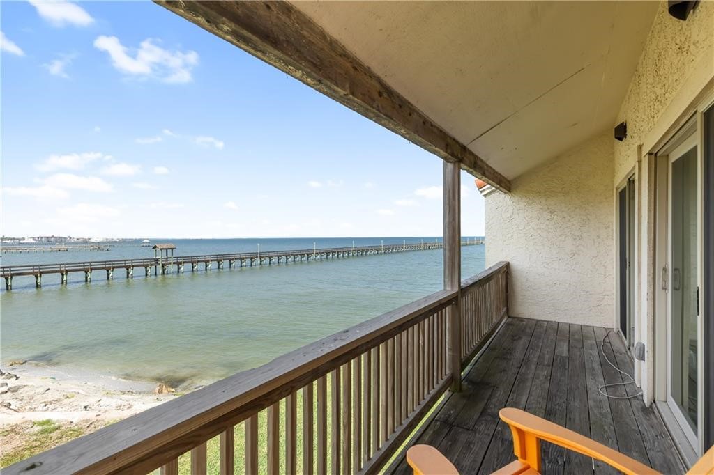 620 South Fulton Beach Road, Unit 308 Rockport, TX 78382 - Photo 22 of 30 a view of an ocean from a balcony