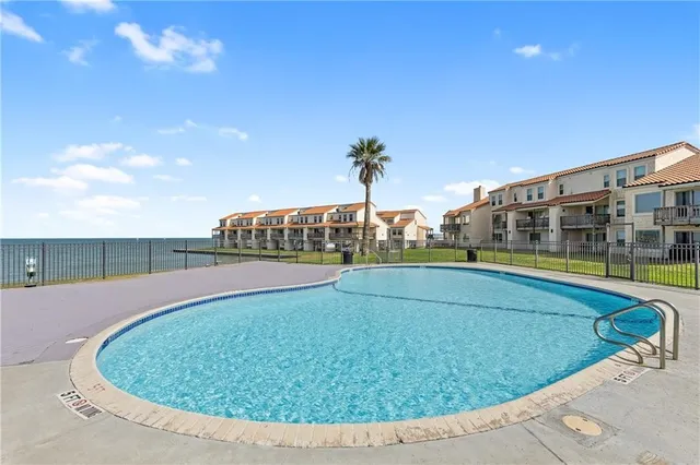a view of outdoor space and swimming pool