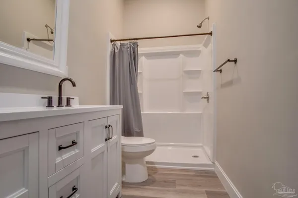 a bathroom with a sink and a toilet