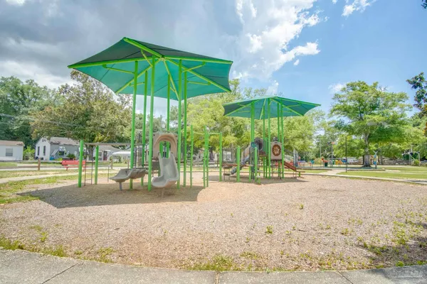 a view of park with wooden floor and a table