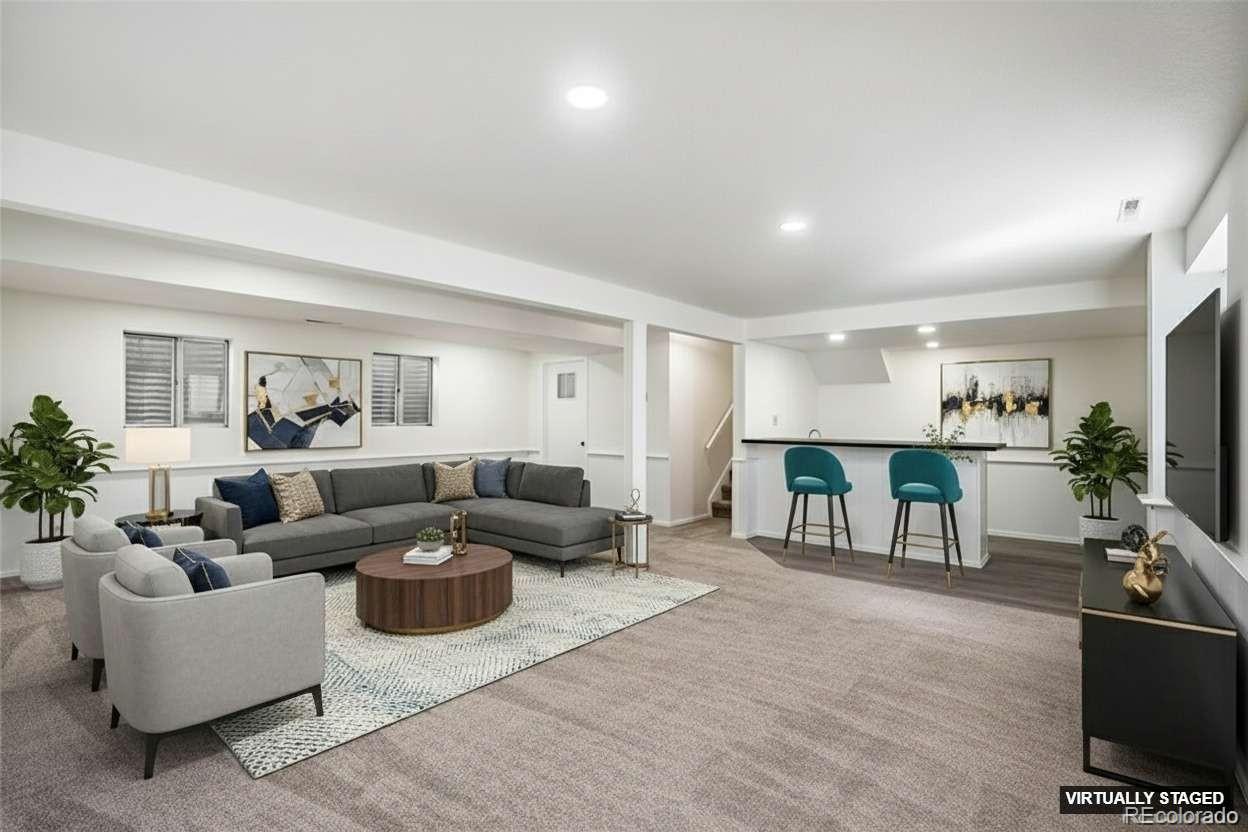 6075 Castlewood Lane Colorado Springs, CO 80918 - Photo 10 of 23 a living room with furniture