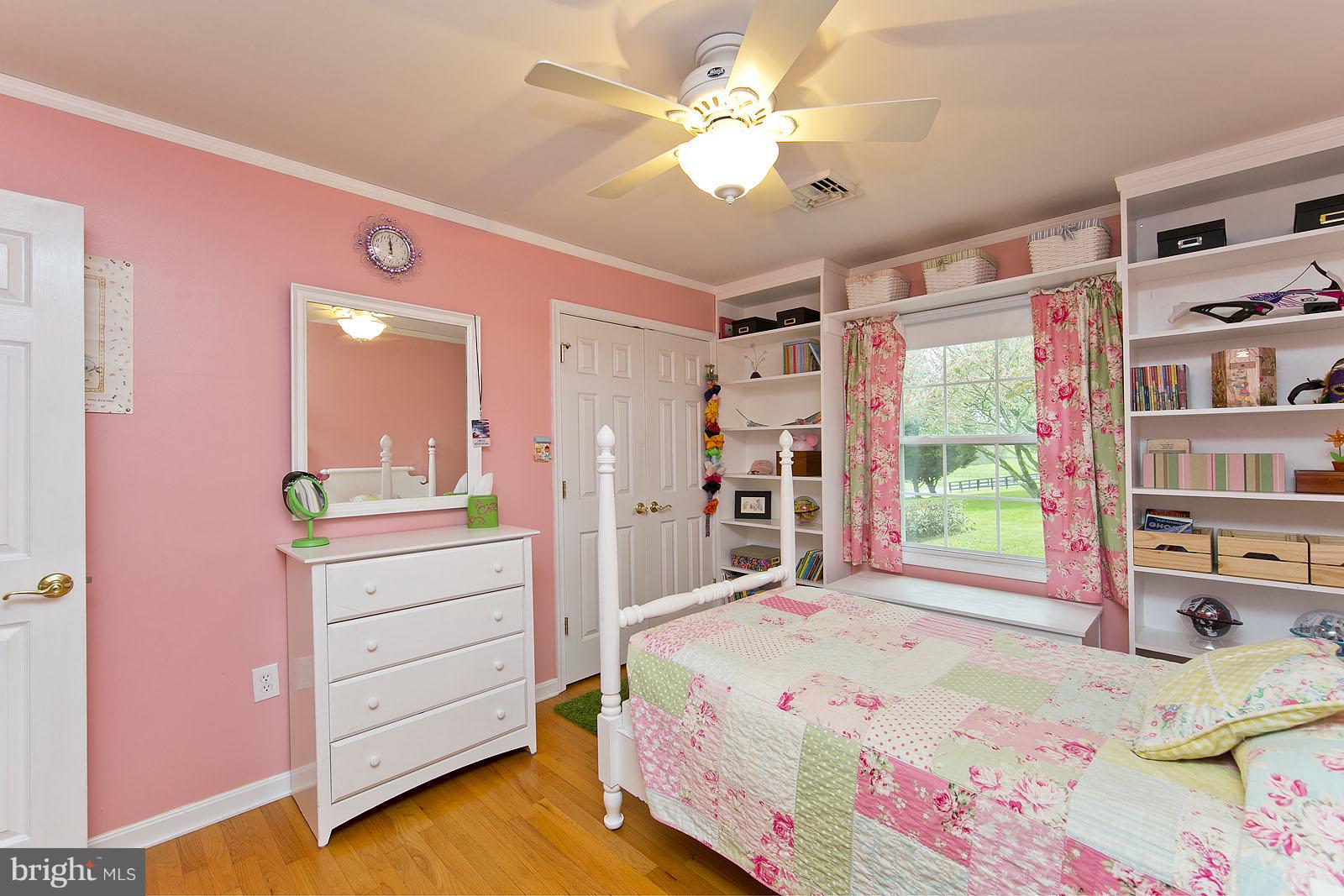 2360 Hunting Ridge Road Winchester, VA 22603 - Photo 14 of 30 a bedroom with a bed dresser and a window