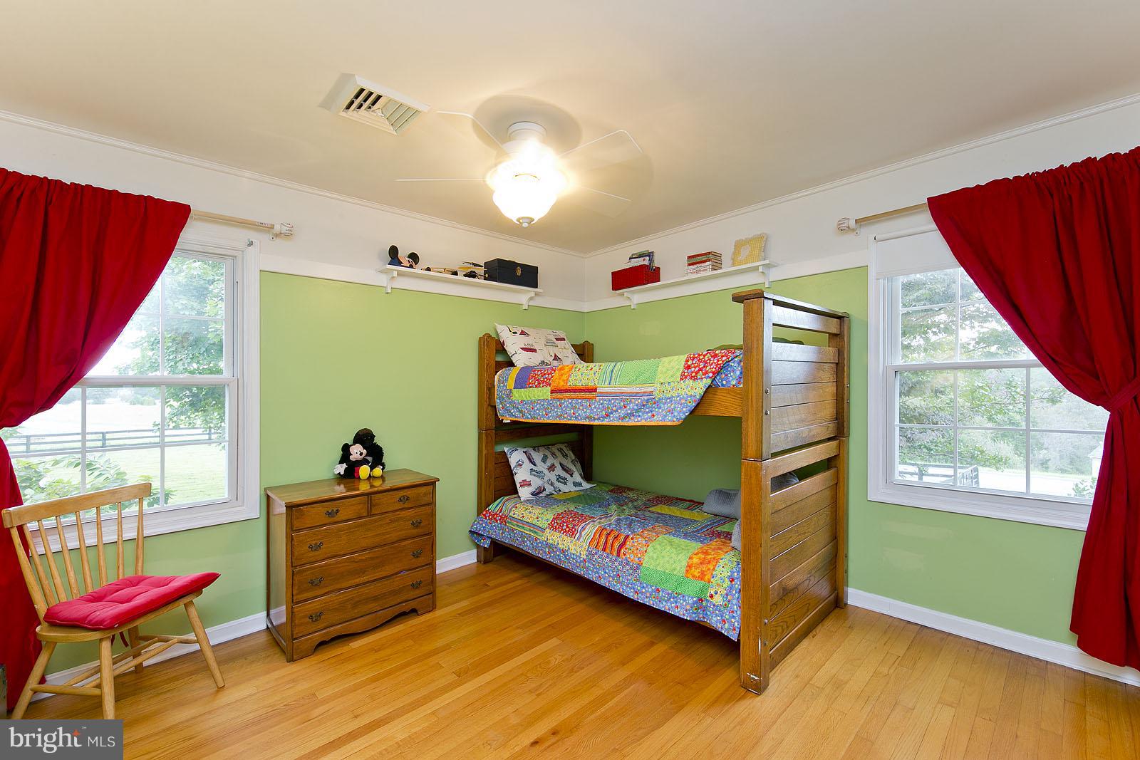 2360 Hunting Ridge Road Winchester, VA 22603 - Photo 15 of 30 a bedroom with furniture and window