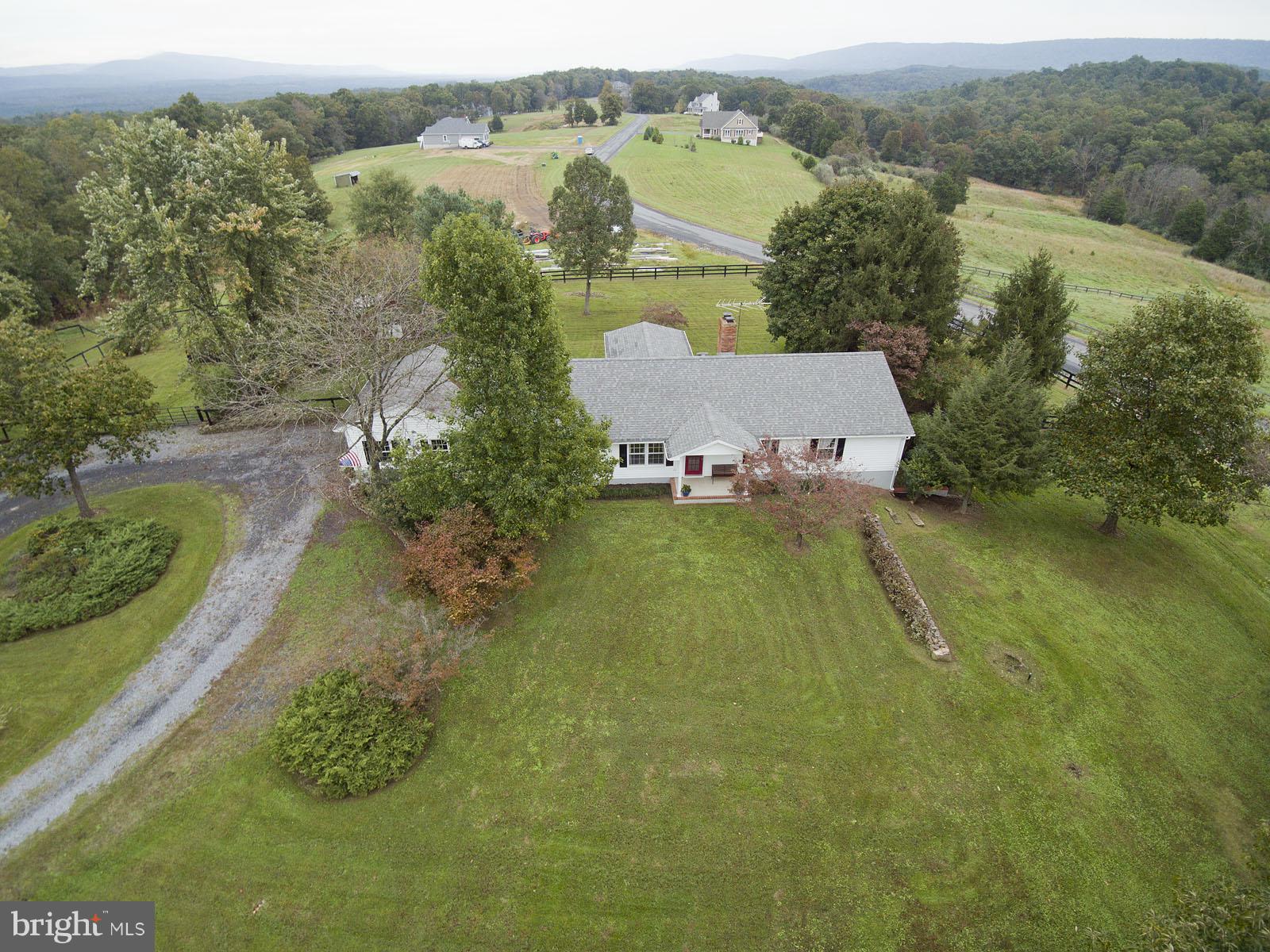 2360 Hunting Ridge Road Winchester, VA 22603 - Photo 25 of 30 an aerial view of a house with a garden and lake view