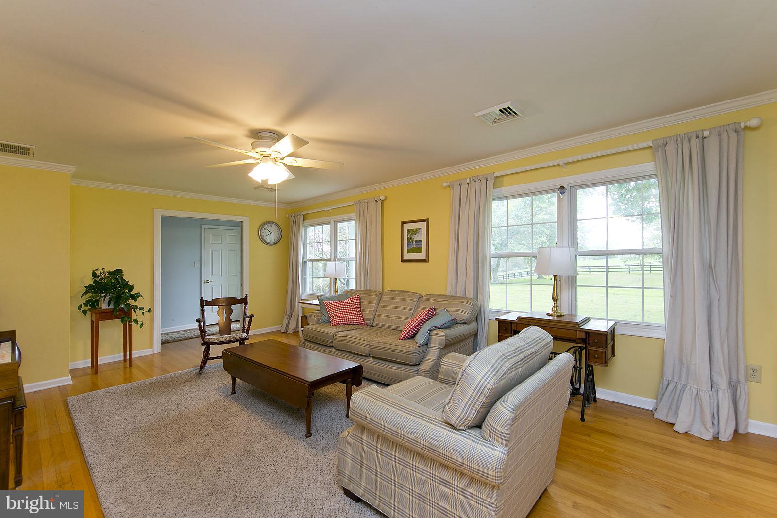 2360 Hunting Ridge Road Winchester, VA 22603 - Photo 10 of 30 a living room with furniture and a large window