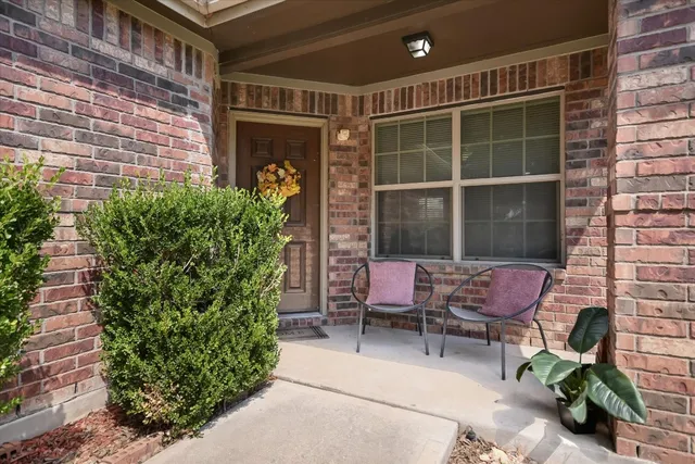 a view of a lounge chairs in the patio