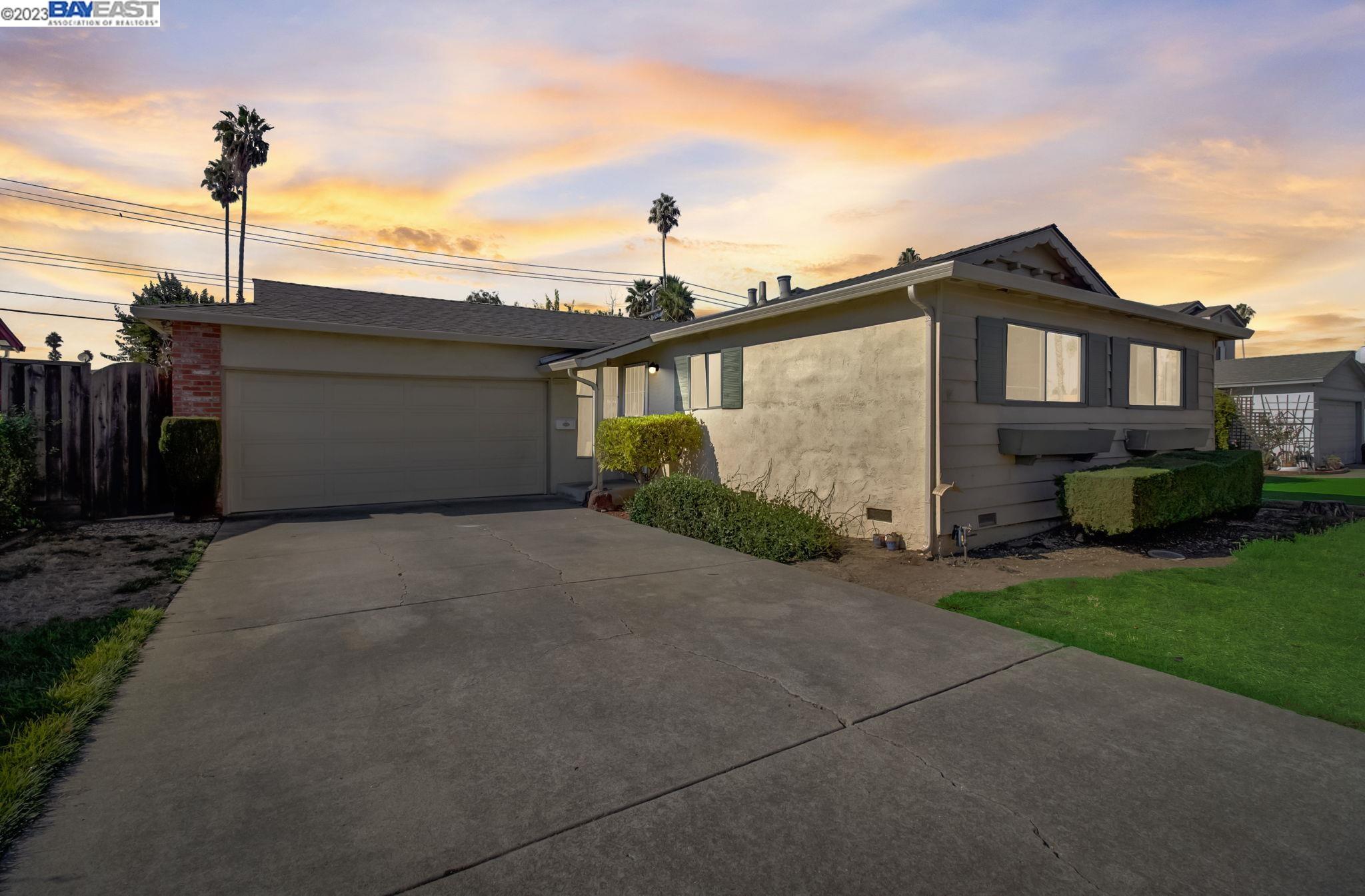 39665 Banyan Tree Road Fremont, CA 94538 - Photo 1 of 1 a front view of a house with garden