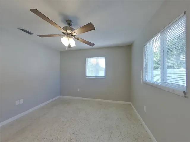 a view of a window in an empty room