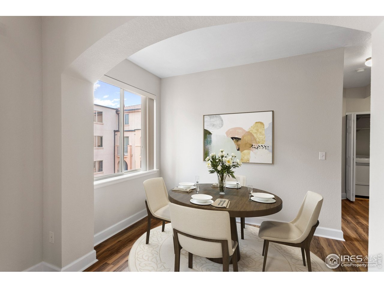 4500 Baseline Road, Unit 3302 Boulder, CO 80303 - Photo 11 of 22 a view of a dining room with furniture and chandelier