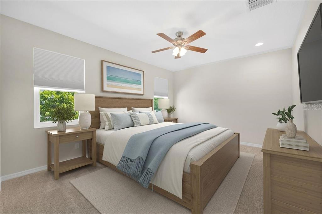 5124 Clover Mist Drive Apollo Beach, FL 33572 - Photo 26 of 52 a bedroom with a bed and a window
