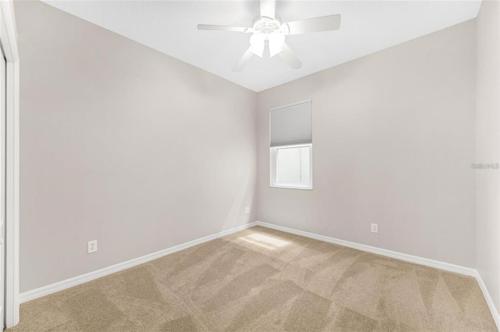 5124 Clover Mist Drive Apollo Beach, FL 33572 - Photo 33 of 52 an empty room with a fan & a window