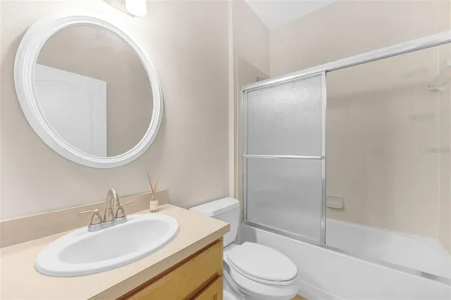 an empty room with a bathroom