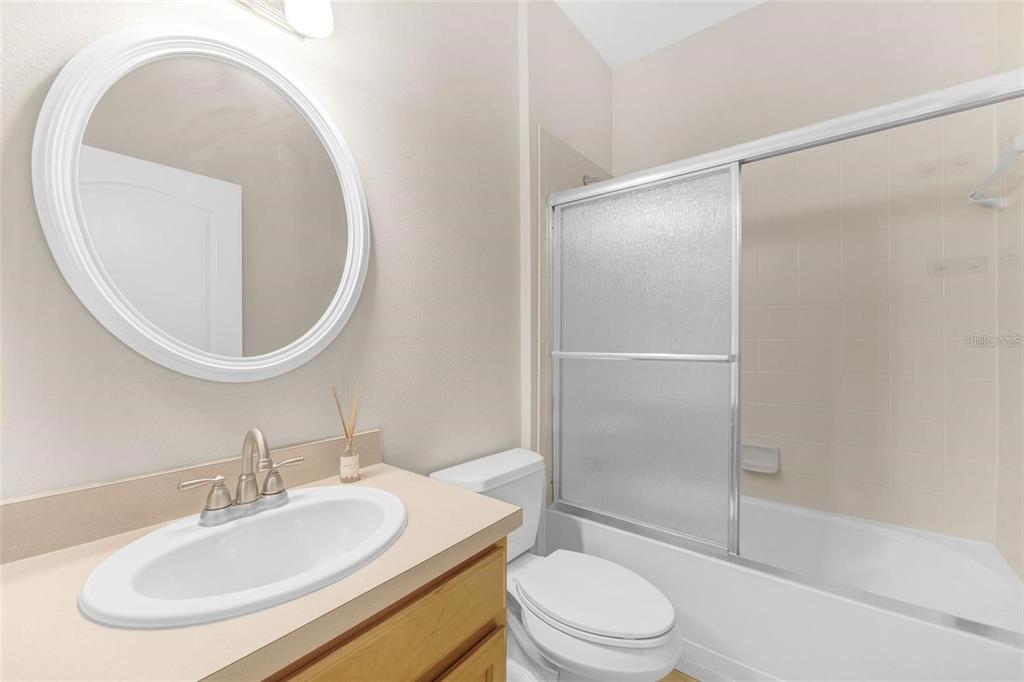 5124 Clover Mist Drive Apollo Beach, FL 33572 - Photo 34 of 52 a bathroom with a sink toilet and shower