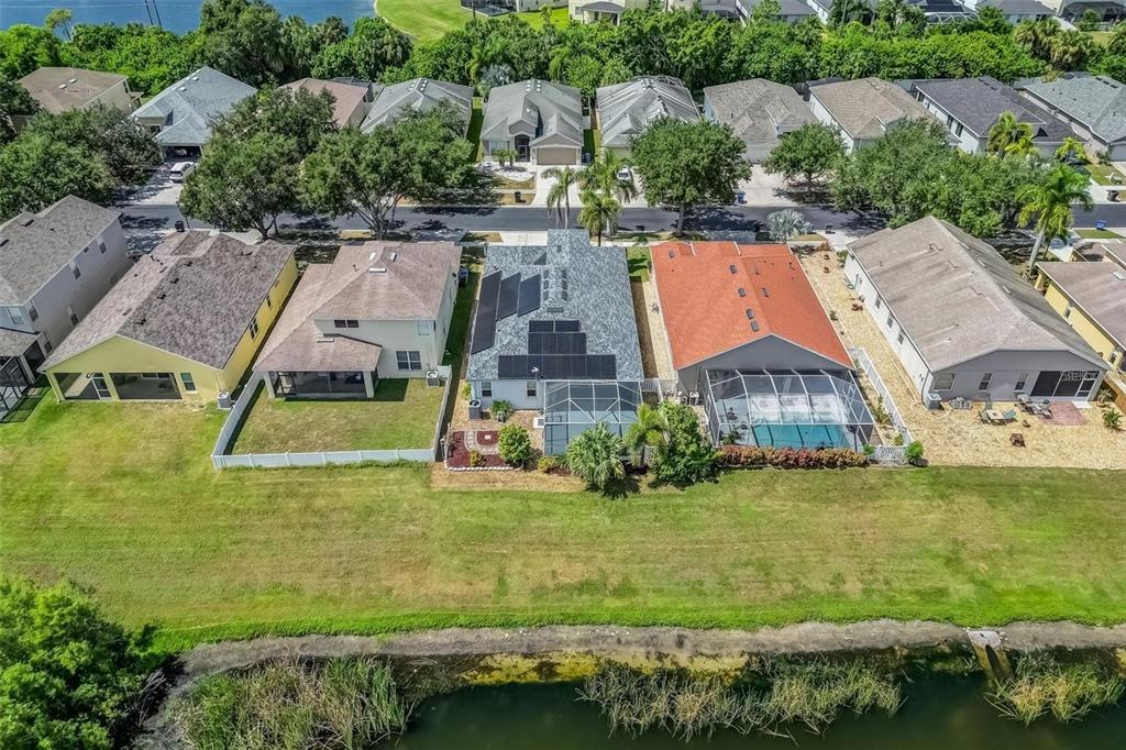 5124 Clover Mist Drive Apollo Beach, FL 33572 - Photo 45 of 52 an aerial view of residential houses with outdoor space and swimming pool