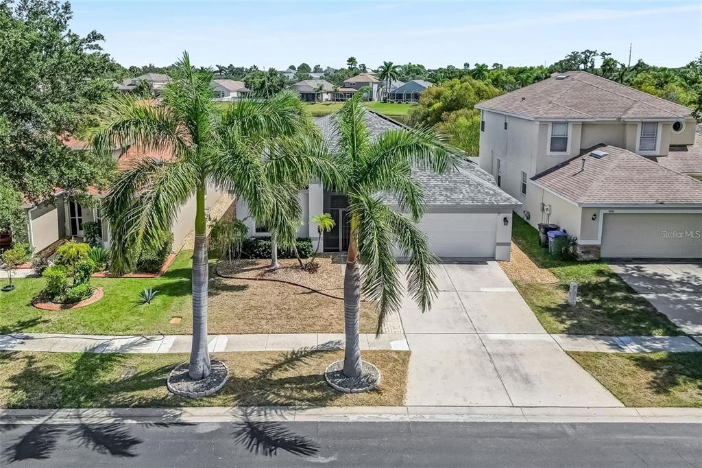 5124 Clover Mist Drive Apollo Beach, FL 33572 - Photo 49 of 52 a view of a house with a yard