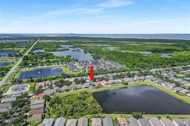 a view of a city with an ocean