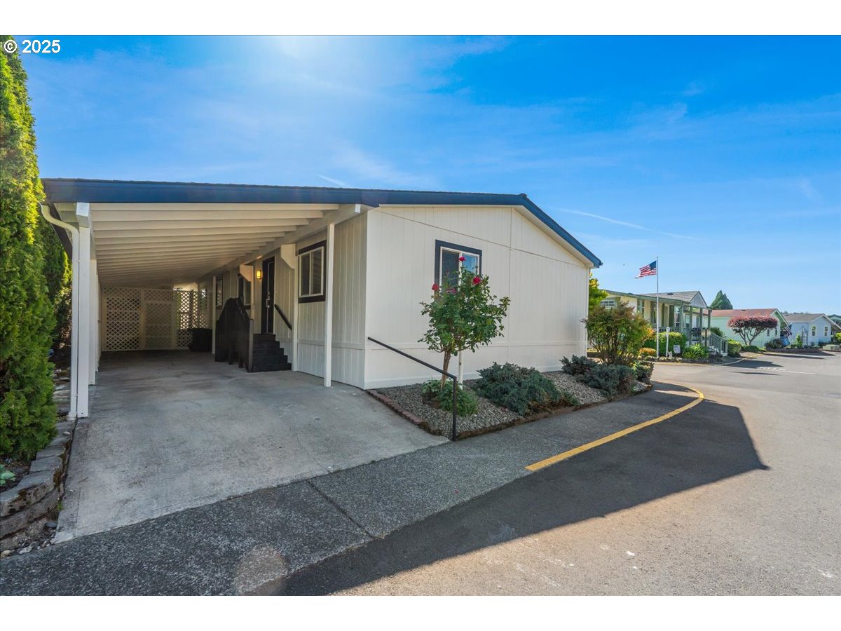 369 Gun Club Road, Unit 117 Woodland, WA 98674 - Photo 1 of 29 a view of a house with a yard