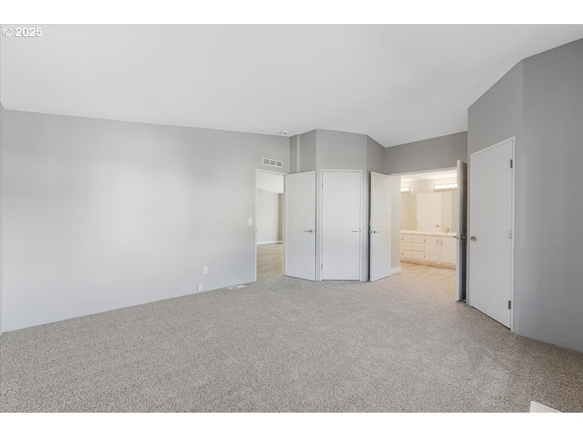 369 Gun Club Road, Unit 117 Woodland, WA 98674 - Photo 18 of 29 a view of an empty room