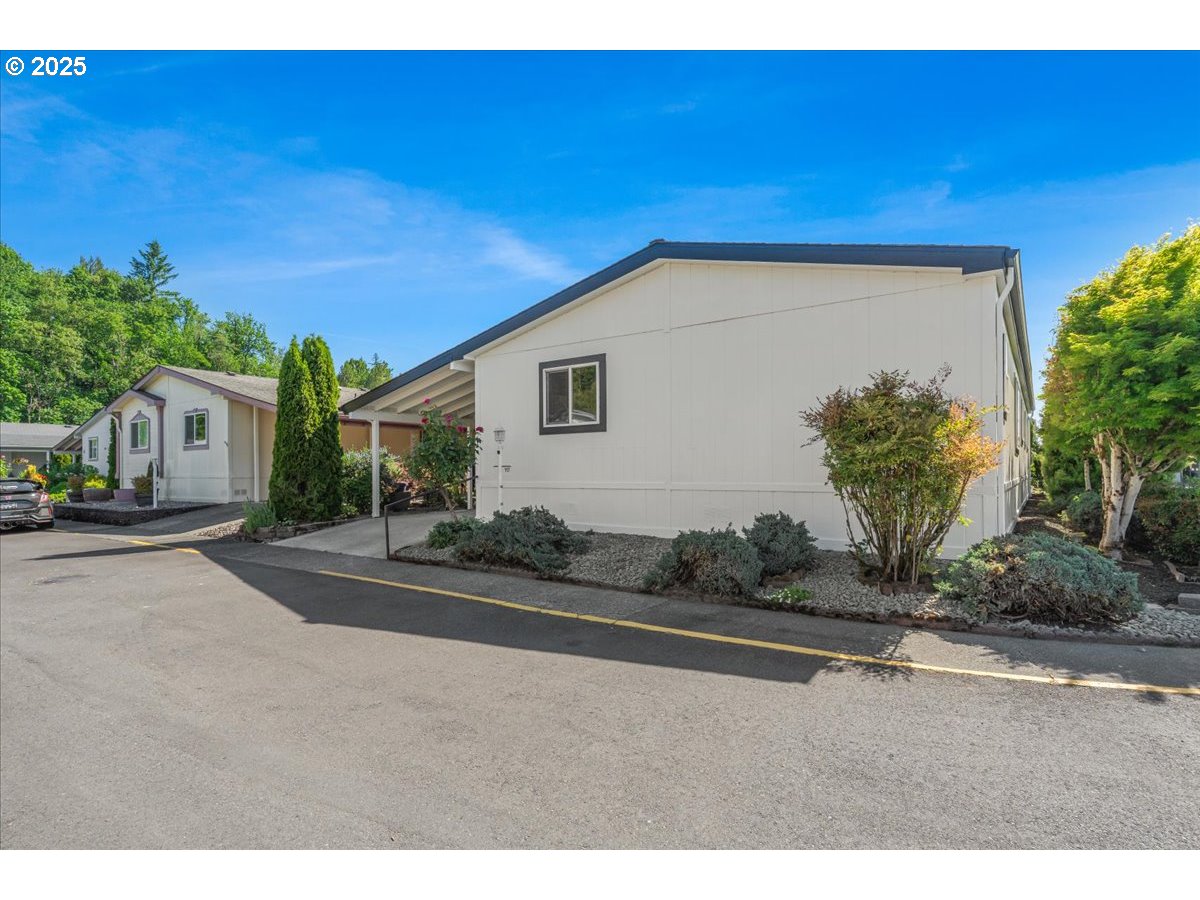 369 Gun Club Road, Unit 117 Woodland, WA 98674 - Photo 28 of 29 a house view with a outdoor space