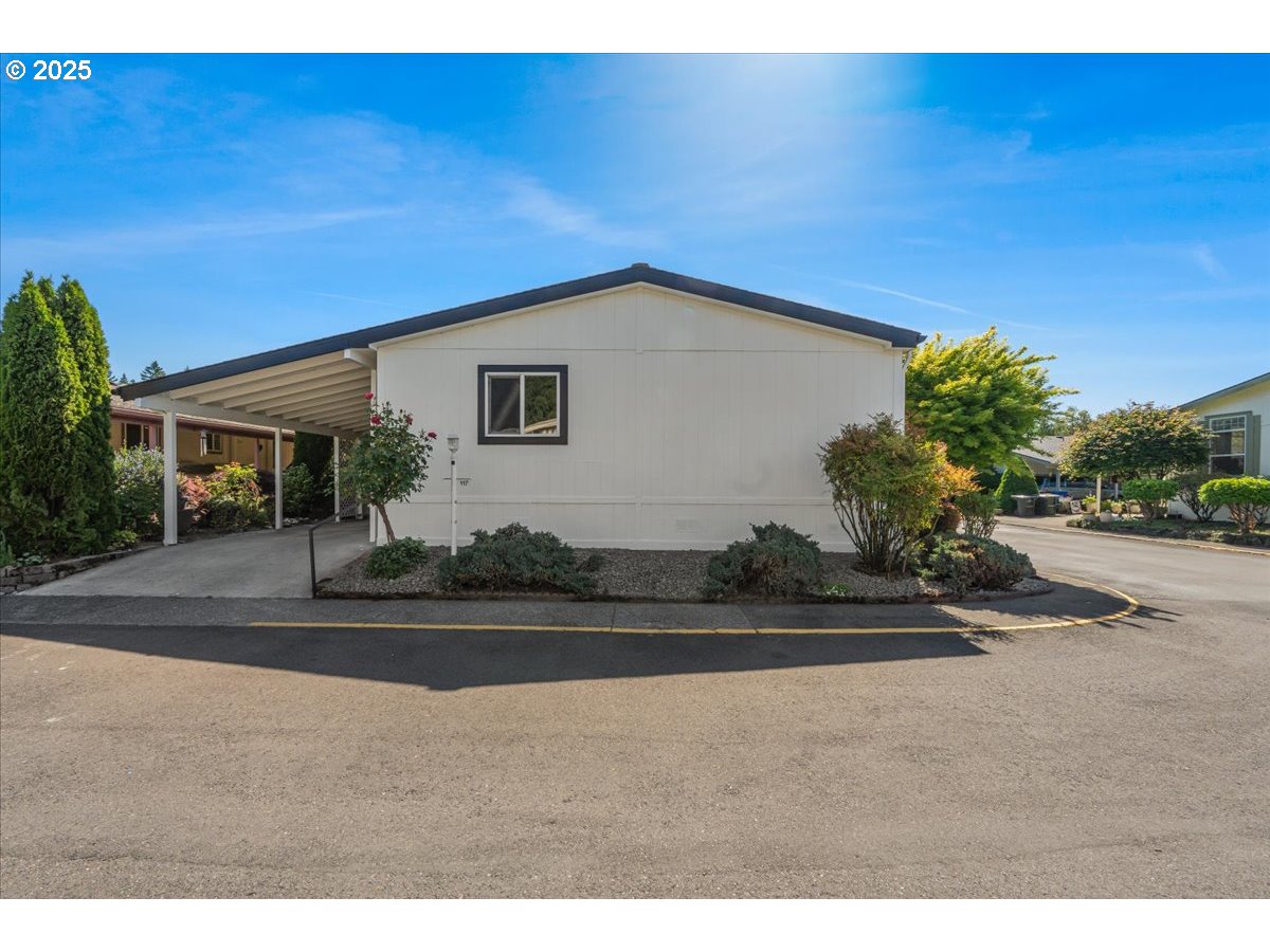 369 Gun Club Road, Unit 117 Woodland, WA 98674 - Photo 29 of 29 a house view with a outdoor space
