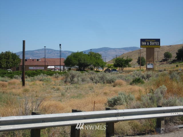 a view of a yard from a balcony